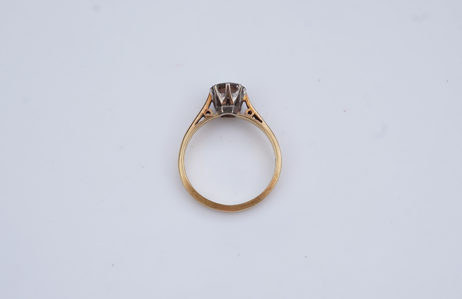 A diamond solitaire ring